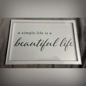 Home decor print in white frame